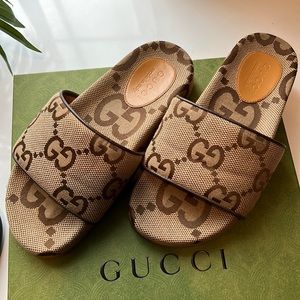Guccis unisex canvas slides